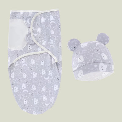 Bonnet bébé fille et emmaillotage