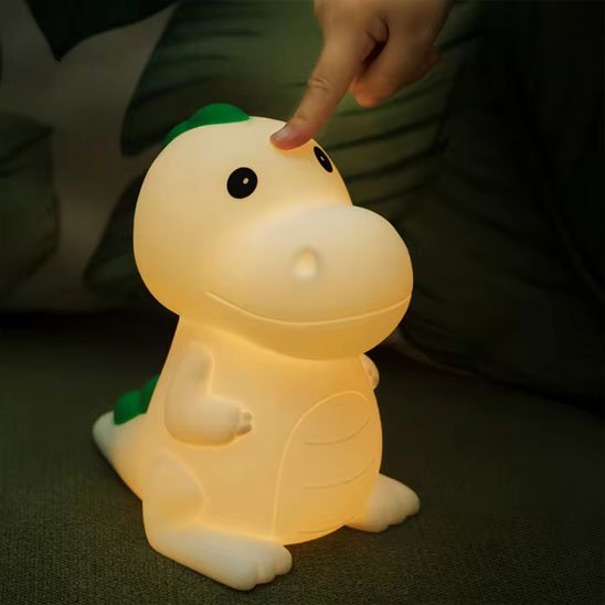 Veilleuse dinosaure une main qui joue et allume dino