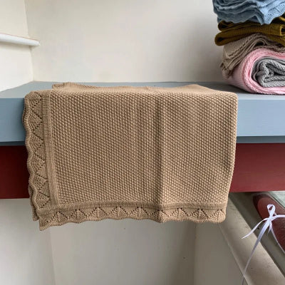 couverture en coton beige brune