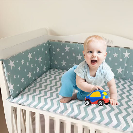 Réducteur de lit bébé sourire