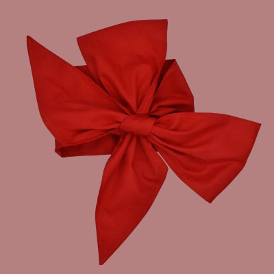 une couverture pour emmaillotage fonce rouge