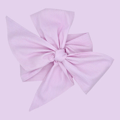 une couverture pour emmaillotage rose