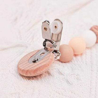 Attache Tetine en Bois bouton rond rose