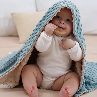 Une couverture douce bebe coton 