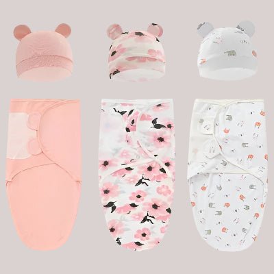 Une couverture emmaillotage bébé pour fille 