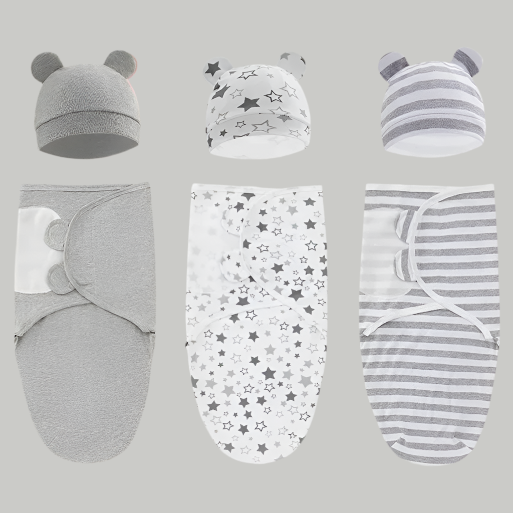 Une couverture emmaillotage bébé grise 