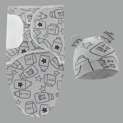 Un couverture emmaillotage bébé grise 