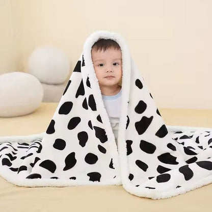 Une belle couverture chaude et douce de vache 