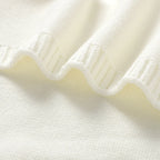 Couverture chaude bébé zoom sur couverture beige
