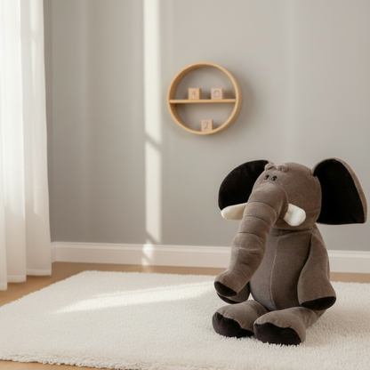 Peluche éléphant seul assis trompe