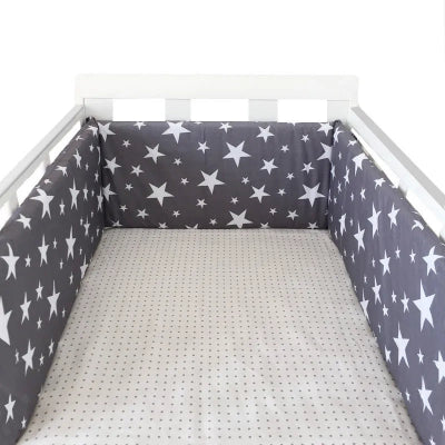 Réducteur de lit bébé bleu étoiles