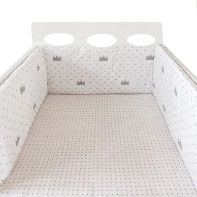 Réducteur de lit bébé couronnes grises