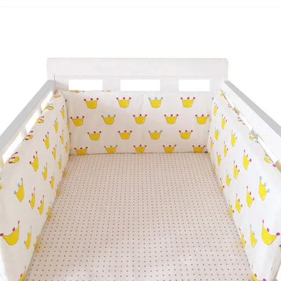 Réducteur de lit bébé couronnes jaunes