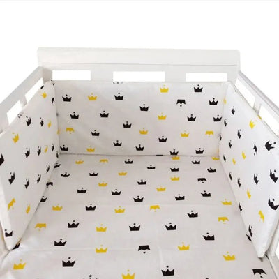Réducteur de lit bébé couronnes jaunes et noires