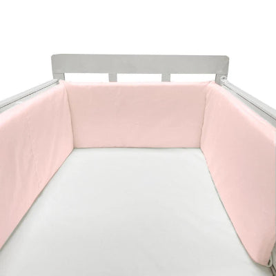 Réducteur de lit bébé rose