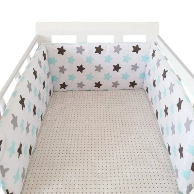 Réducteur de lit bébé étoile turquoise