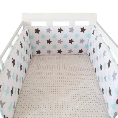 Réducteur de lit bébé étoile turquoise