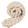 tresse de lit bebe beige enroullee en boule