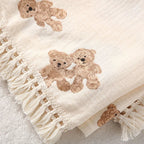cocon d emmaillotage
franges et oursons