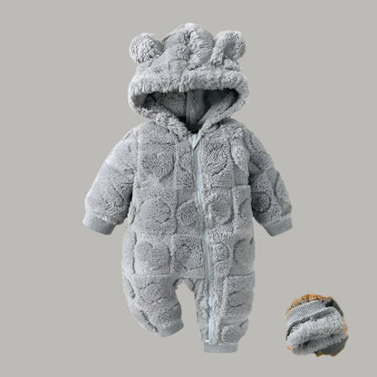 Une barboteuse bébé garçon chaude avec capuche grise 