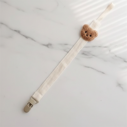 attache tétine coloris blanc Attache-sucette ourson crème
