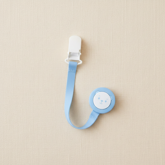 attache tetine clip une Attache tétine Bleu - fond doux