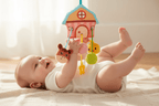 jeux d'éveil bébé 3 mois
Bébé pieds en l'air joue textures jouet ferme