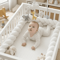 Tresse de Lit 3M Bébé sur le ventre dans le lit tressé