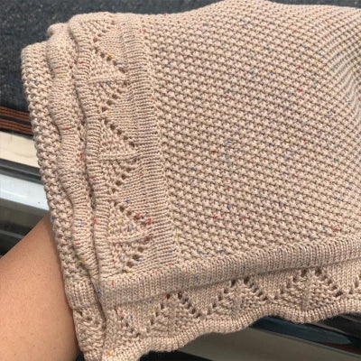 couverture en coton beige pâle