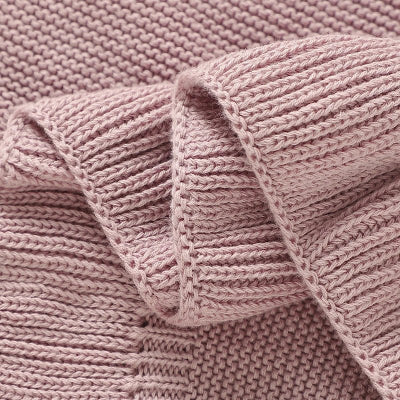couverture en coton rose pâle