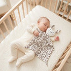 Doudou mixte bebe sure le dos
