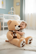 Ourson Peluche Gros Compagnon - Doudou Géant
ourson en peluche Bébé garçon jouant avec l'ourson brun geant