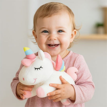  bebe Licorne peluche blanche et bebe sourire