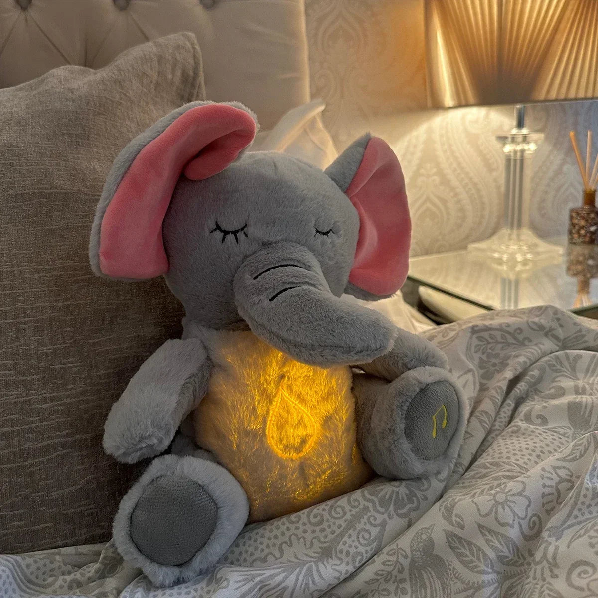 peluche bebe elephant ventre lumineux