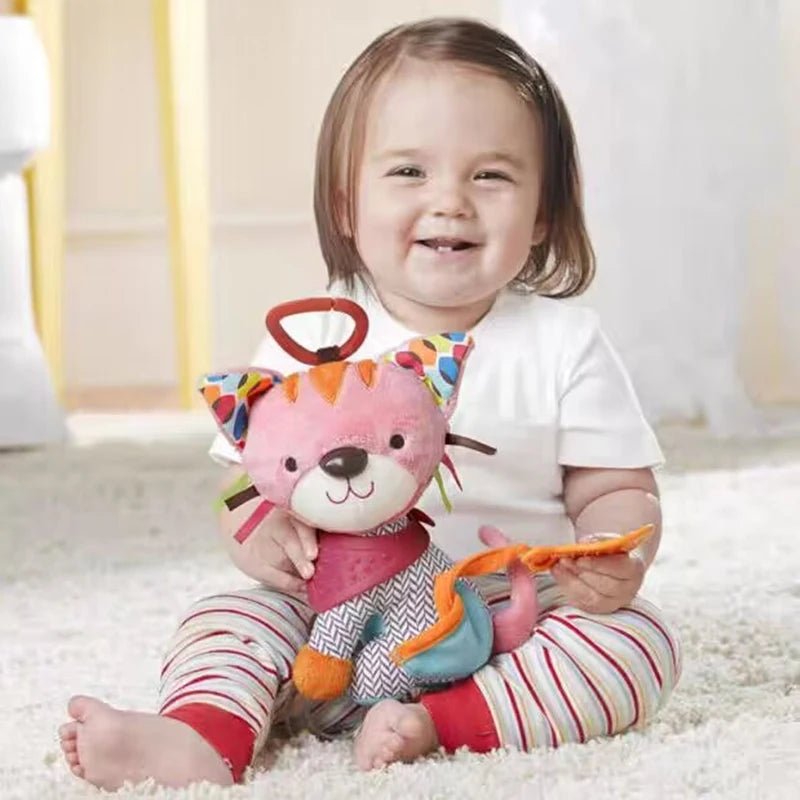 peluche musicale bebe d’un chien rose avec jouet de dentition