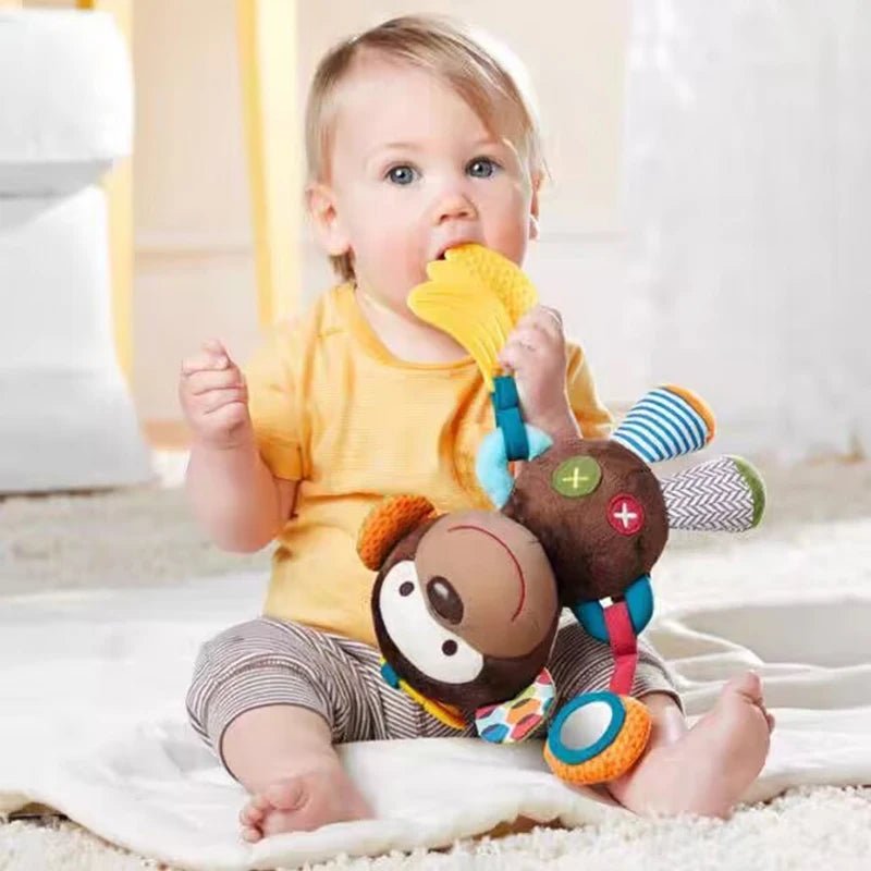 peluche musicale bebe
 d’un petit singe avec jouet de dentition