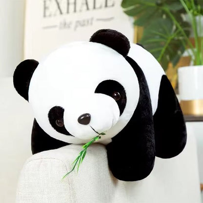 peluche pour bebe Peluche panda ui mange du fouin