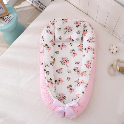 reducteur de lit cododo rose
