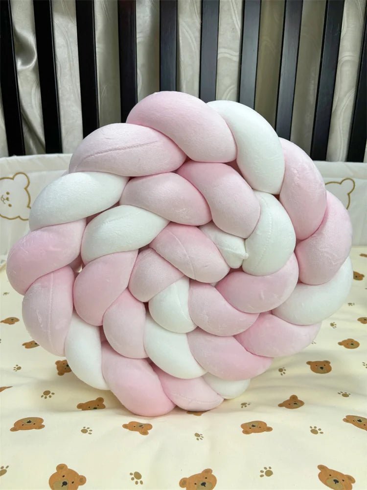 tour de lit bébé tressé rose banc