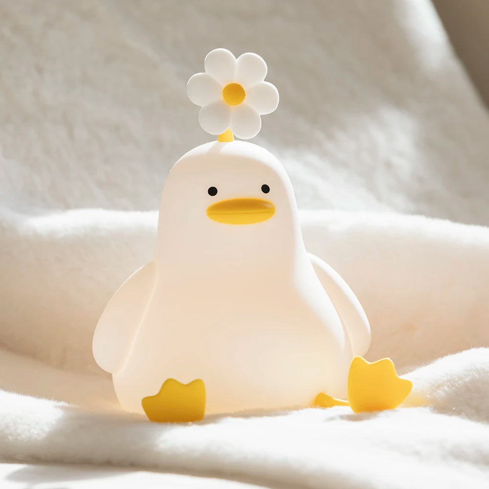veilleuse canard avec fleur marguerite