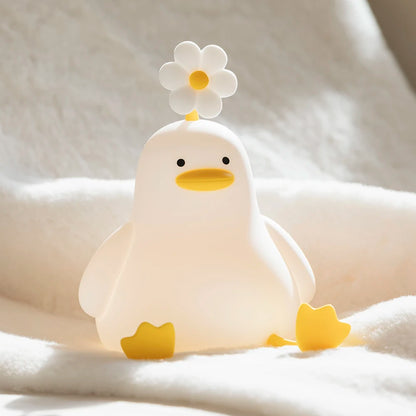 veilleuse canard avec fleur marguerite